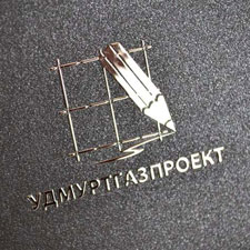 Металлостикер с корпоративным логотипом производственной компании